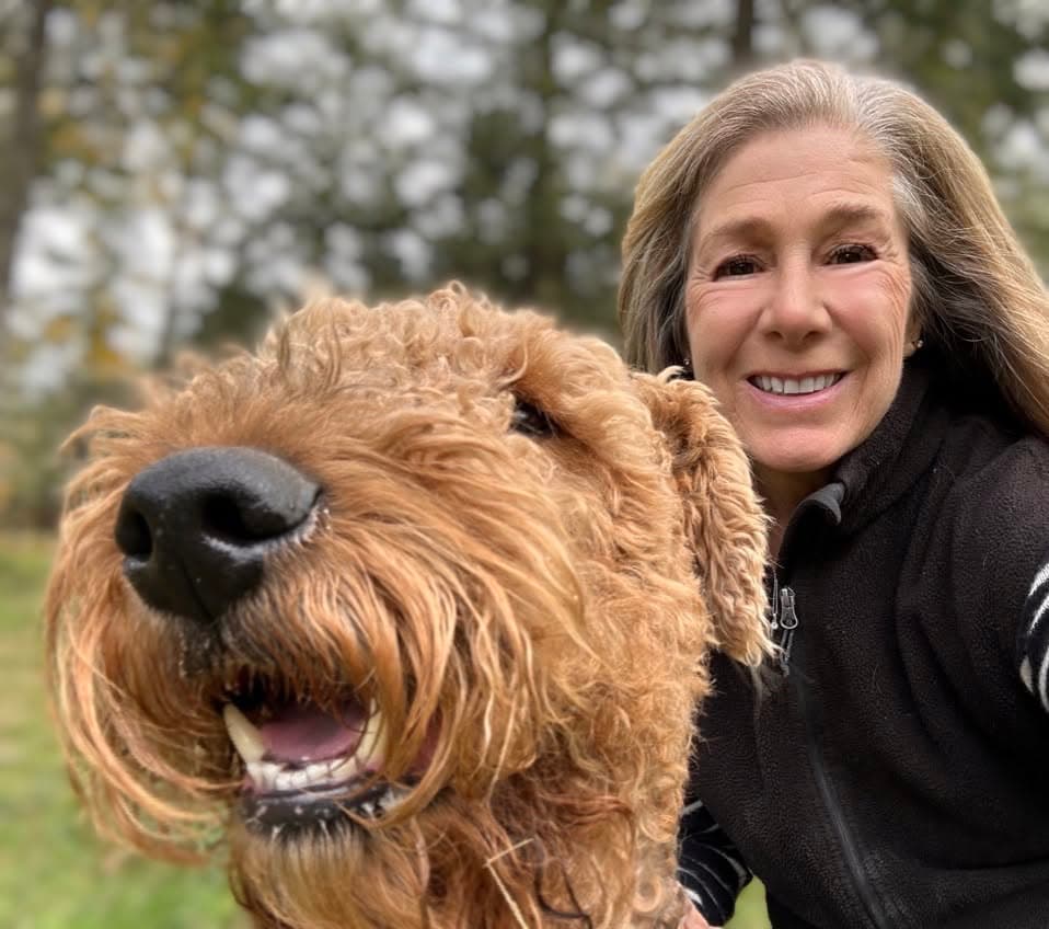 Kim Harris outdoors with her dog